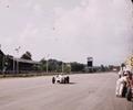 From The Lens Of Bob Wilke.
Great shot of the front straightaway and grandstands of the Monza Italy race track. Coming at you is the 1957 overall winner Jimmy Bryan in his #1 Sailh Offy. Jimmy finished 2nd overall to winner Jim Rathmann.