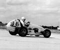 December 12,1959 The First Grand Prix of the United States. Driver Rodger Ward wheels the Ralph Wilke owned Leader Card 110 Offy midget. Ralph installed a two speed gear box with a clutch in the #1 midget so Rodger could shift in the turns. Ward started 19th and finished 10th.
