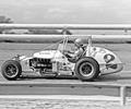 August 24th 1975 Du Quoin, IL Tom Bigelow in the Leader Card Silver Crown Watson dirt car. Bigelow would lead all 100 laps on his way to victory.