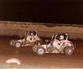 July 23 1983 Sun Prairie, WI. Angell Park Speedway.
Wilke Racer teammates Kevin Olson and Dan Fredenberg battle for position in their Pabst Blue Ribbon coil over Greg Wilke designed midget with AutoCraft VW. KO won the event.
