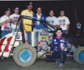 July 31 1990. Lincoln, NE.Eagle Raceway.
Jeff Gordon shows off his first place Eagle trophy.
Team Wilke celebrates with Jeff.