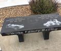 Wilke Family Leader Card Racers Marble Bench outside the High Banks Hall of Fame & National Midget Auto Racing Museum in Belleville, KS