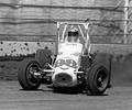 September 9, 1972 Indiana State Fairgrounds. Hoosier Hundred. Driver Mike Mosley in the Leader Card Watson Coil Over Ford, Vivitar Special. Mike started 14th ran 57 laps before retiring 18th with fuel pick up issues.