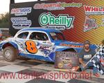 IMCA Sport Mod Rookie Coy Vlies cashes in at Outagamie Speedway.