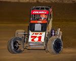 COLWELL RECEIVES RACE OF CHAMP