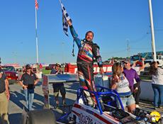 Mike Bruce in Novelis Supermodified Victory Lane -