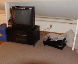 Upstairs Tv, dvd player and vcr.