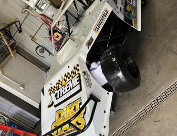 Tom Berry Jr.s No. 11X Dirt Modified in the shop.