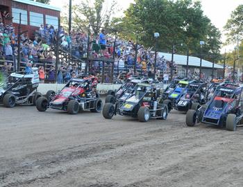 USAC midgets do their four-wide parade lap before the feature event