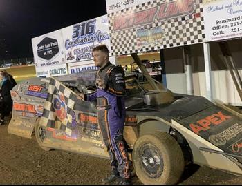 Chase Holland in the victory lane at Deep South Speedway (Loxley, AL) during the season opener on March 23, 2024.