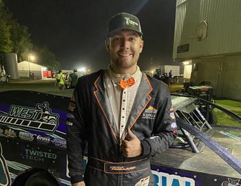 Chase Holland celebrates after winning at Francois County Raceway (Farmington, MO) on June 10, 2023.