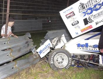 Brady Bacon sailed off the track and punched a hole through the retaining barrier a good distance away from the racing surface