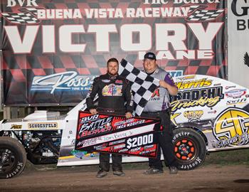 Tom Berry Jr. celebrates in Victory Lane at Buena Vista Raceway (Alta, IA) after winning the IMCA Modified portion of the Battle at the Beaver Dirt Crown on June 7, 2023.