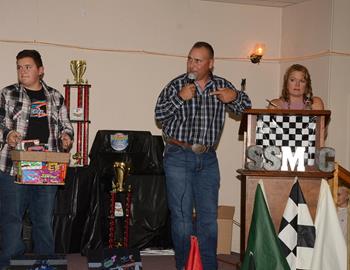 Paul Siegel ran the auction with the help of Jackie Bybee and a host of young volunteers.