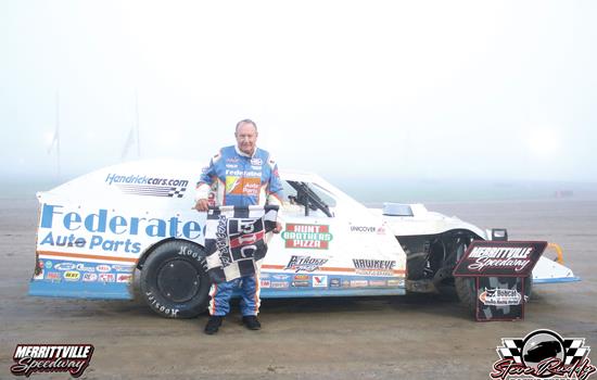SCHRADER SEES CHECKERED CLEARLY AS