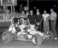 August 31 1984 Little Springfield Speedway - Springfield, IL  
L-R Mark Wilke, Troy Richards, Kevin Olson, Driver Ricky Hood & Greg Wilke. Ricky subs for regular driver Kevin Olson who broke his neck earlier in the year at Hales Corners Speedway in Wisconsin. This was Rickys first time in a midget, he won the feature.
