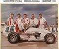 1959 U.S. Grand Prix Leader Card Midget. L-R Ralph Wilke, Gus Wesell, Rodger Ward, Bob Wilke & Ronnie Kaplen. Ralph Wilke installed a two speed gear box with a clutch in the #1 Midget so Rodger Ward could shift in the turns  
