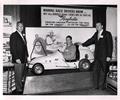 Circa 1960 L-R Jimmy Bryan, Rodger Ward (in car) & Sam Hanks, attending a trade show for the Raybestos Company.

