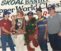 1988 Phoenix, AZ. Copper World Classic Rich Vogler wheeled the Wilke Cosworth to victory lane. this would be the first of three wins at the Copper World Classic for the Wilke Team. L-R Rich Vogler, Greg Wilke & Mark Wilke