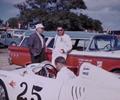 October 22, 23 1960. Monterey, CA. Laguna Seca Raceway.
Leader Card Owner Bob Wilke chats with Driver Rodger Ward. Ward would finish 10th and 23rd in the two day event.
Ward was driving the Leader Card Sportor Porsche 550RS.
Check out the cool Ford Edsel tow vehicle.