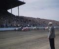  From The Lens Of Bob Wilke.
June 7th 1953 Milwaukee Mile. Bobs photo shows the start of the 100 lap AAA Big Car Event. Driver Manny Ayulo starts form the pole with Rodger Ward outside front row. Fourth place starter Jack McGrath goes on to win and collects $5150.00 for his effort.