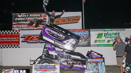 Johnny Smith Drives a Firecracker to Win...