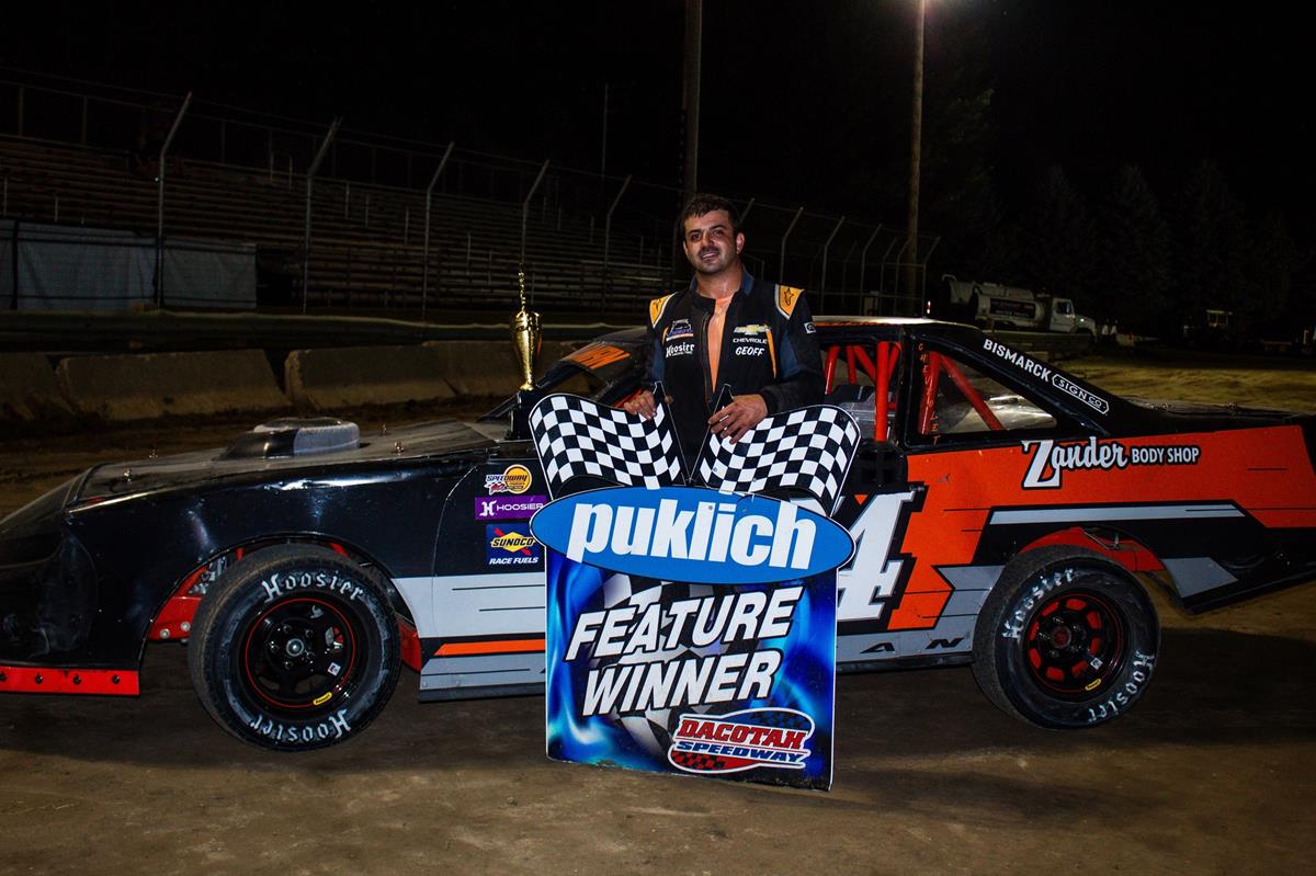 HELLMAN EDGES CARTER AT THE FINISH LINE