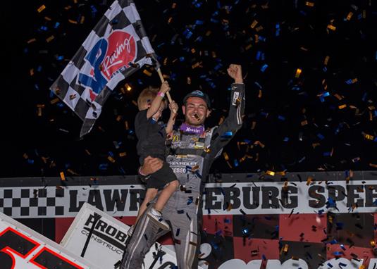 MEMORIAL DAY SPECTACLE: LARSON BEATS BELL, OUTLAWS FOR WIN