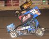 Dusty Defeats Dollar Loan Outlaws