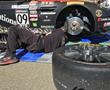 Mechanic John Graham works on set up before Sundays PWC GTS race at Sonoma Raceway.