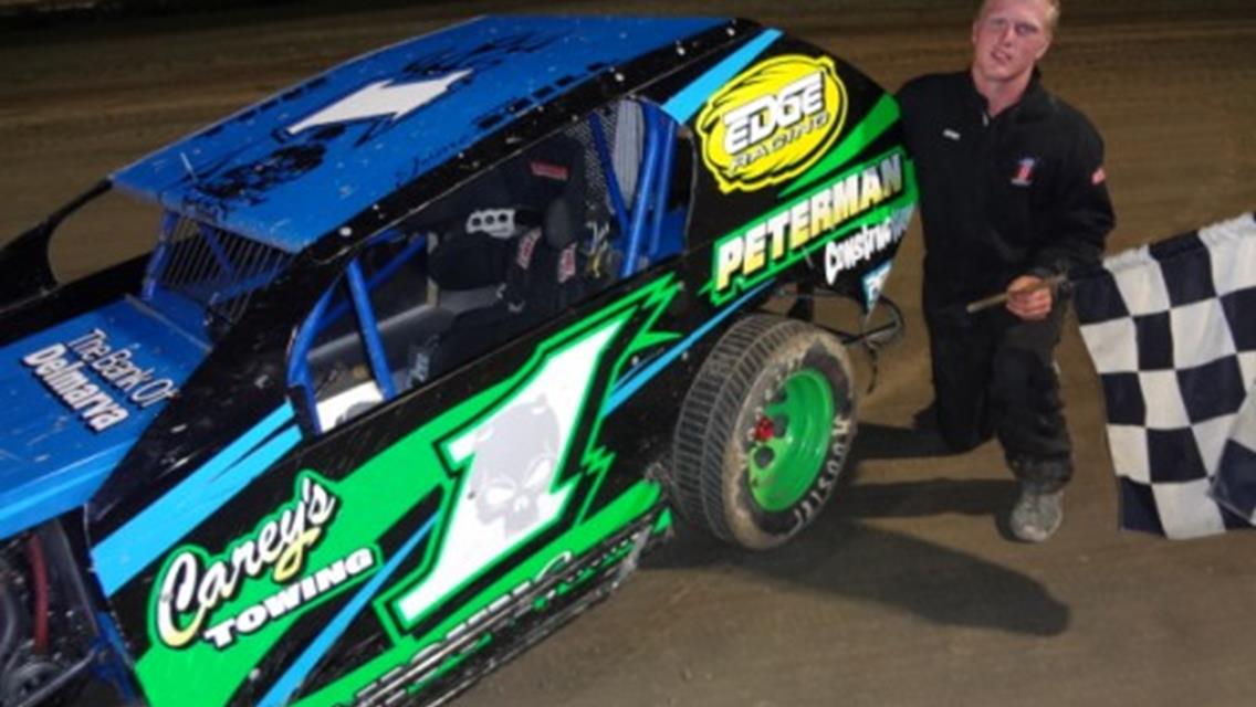 JAMES HILL  MAKES LATE RACE PASS TO WIN MOD LITE MAIN