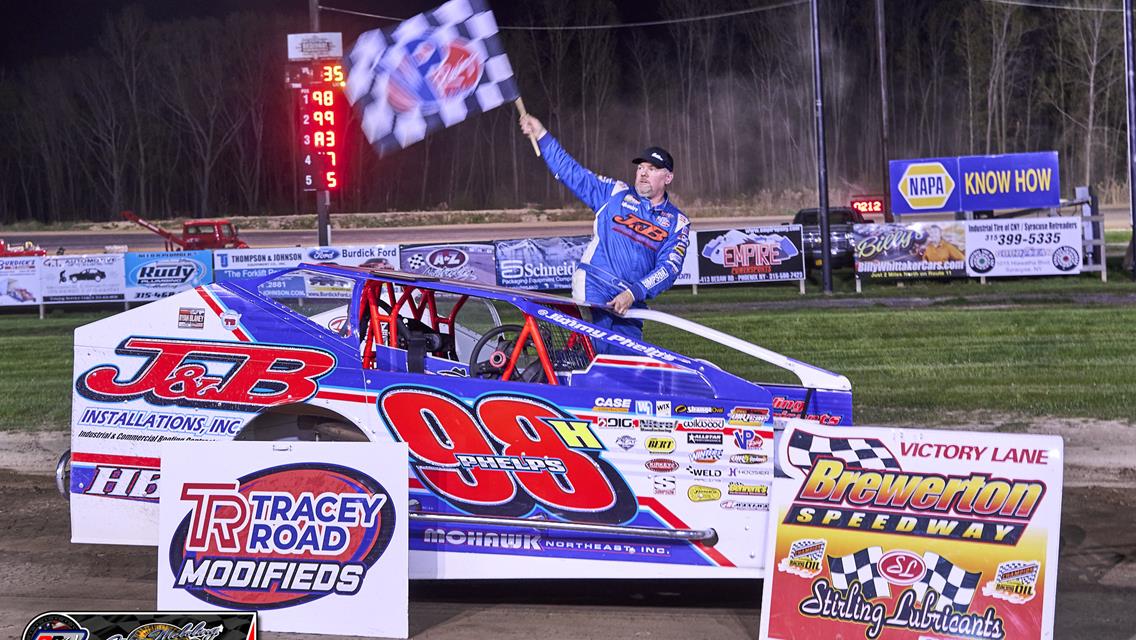 Phelps Outduels Sears for Opening Night Feature win