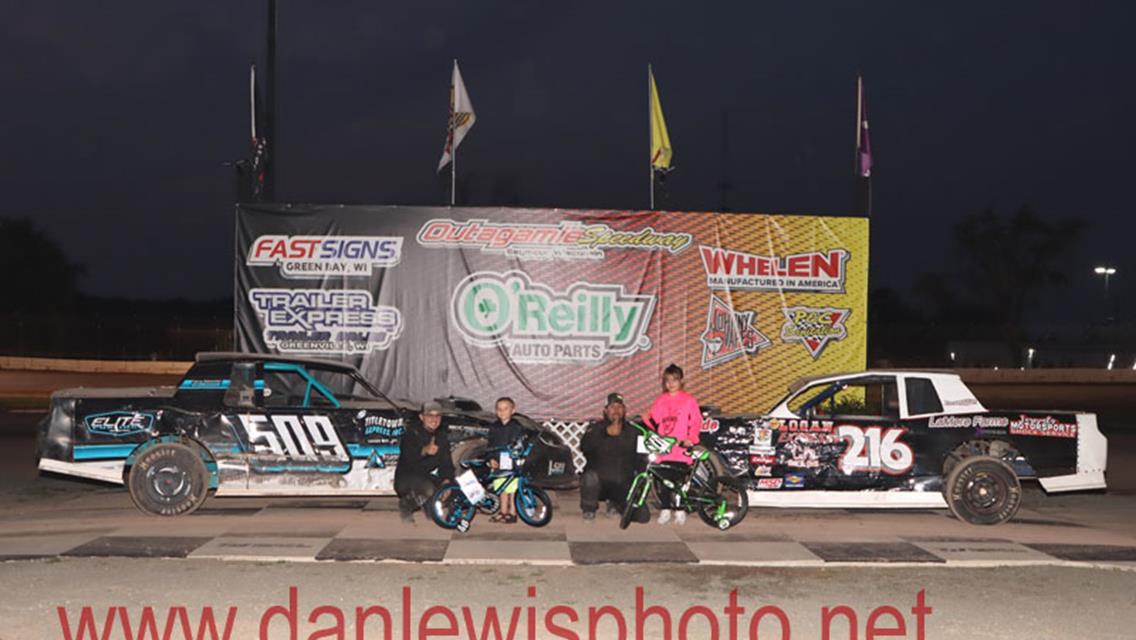 IMCA Sport Mod Rookie Coy Vlies cashes in at Outagamie Speedway.