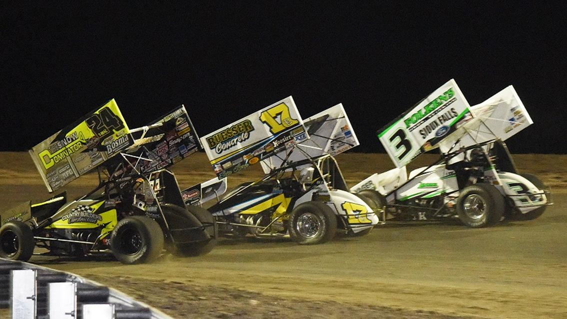 Terry McCarl (24), Bill Balog (17B) and Tim Kaeding (3) fight for the Folkens Bros. Trucking Spring Nationals win at Jackson (Jeff Bylsma Photo)