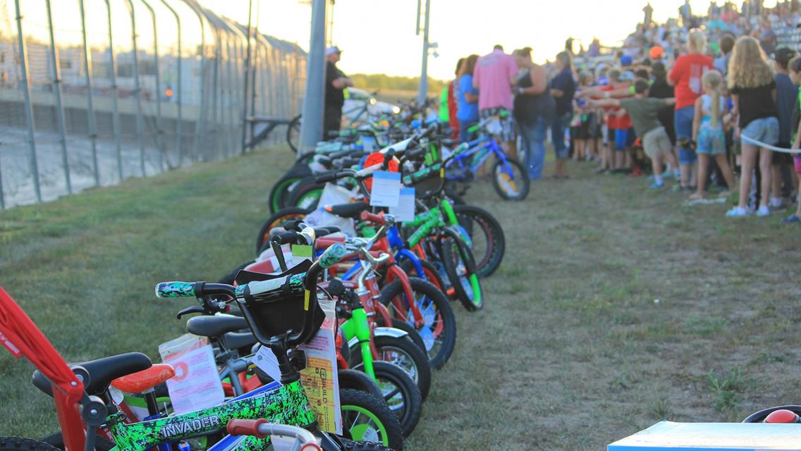 Nearly 100 Bikes Given away at Ogilvie Raceway&#39;s Kids Night!