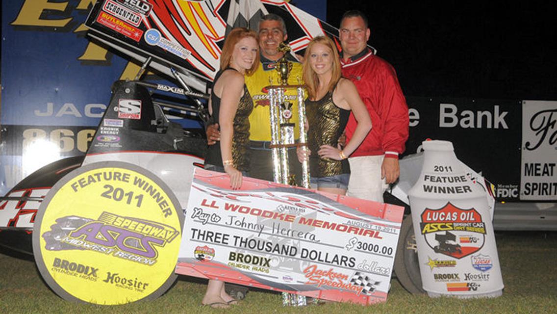 Johnny Herrera enjoys Lucas Oil ASCS presented by K&amp;N Filters National victory lane after topping Friday night&#39;s Loren Woodke Memorial feature event to kick off the 33rd Annual Jackson Nationals in Jackson, MN. (Rob Kocak photo)
