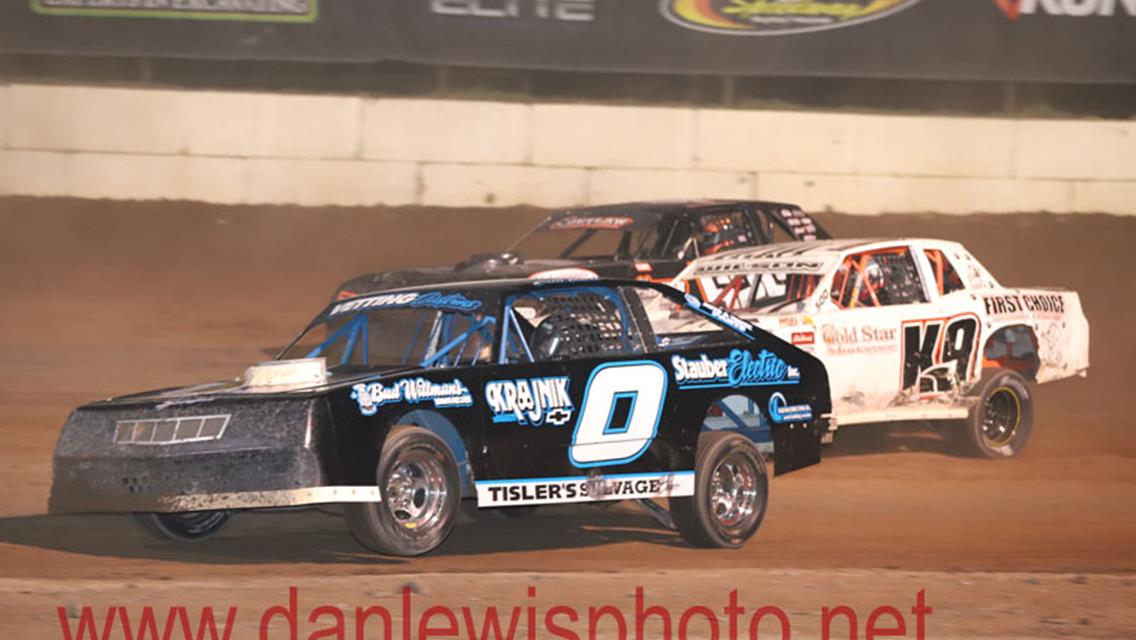 IMCA Sport Mod Rookie Coy Vlies cashes in at Outagamie Speedway.