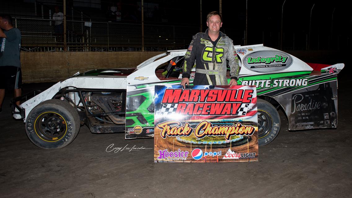 Phillips Wins Race; Cooper and Young Track Champs