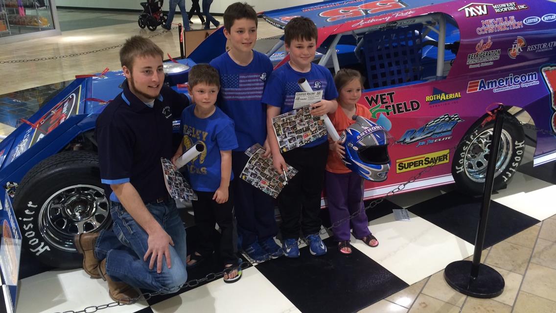 Driver Anthony Roth poses with some young fans at the Cooper/RAD Racing display at Gateway Mall in Lincoln, NE in March, 2015.