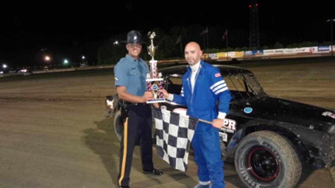 PHIL TRACY NOTCHES 1ST LITTLE LINCOLN WIN