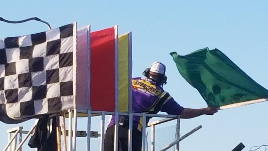 Nathan Peterson waves the green for the field at Park Jefferson Speedway&#39;s South Dakota Sprint Car Nationals.
