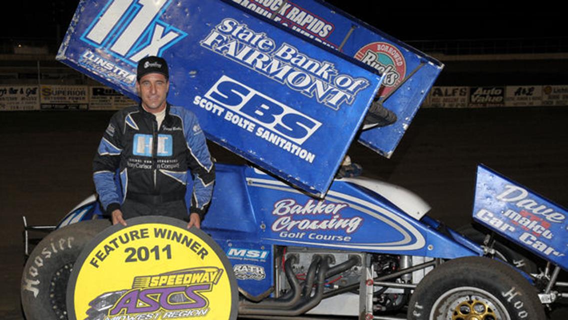 Gregg Bakker in Speedway Motors ASCS Midwest victory lane after winning Saturday night&#39;s 25-lap feature event at Junction Motor Speedway in McCool Junction, NE. (Joe Orth photo)