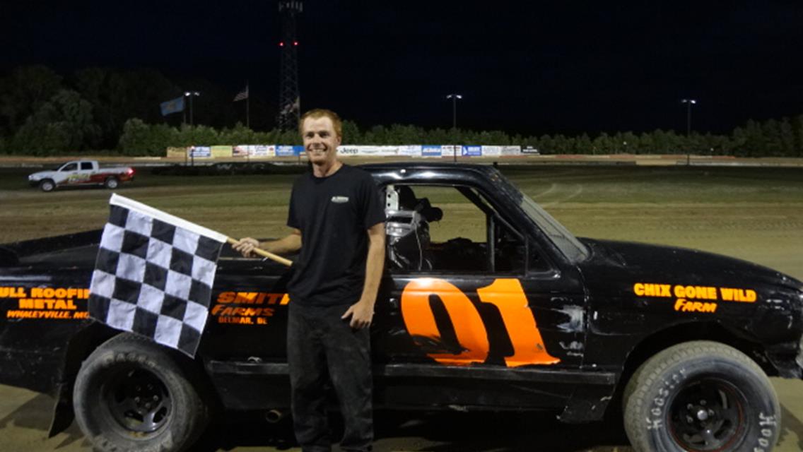 ROBERT SMITH WINS SUPER TRUCKS BY INCHES IN PHOTO FINISH