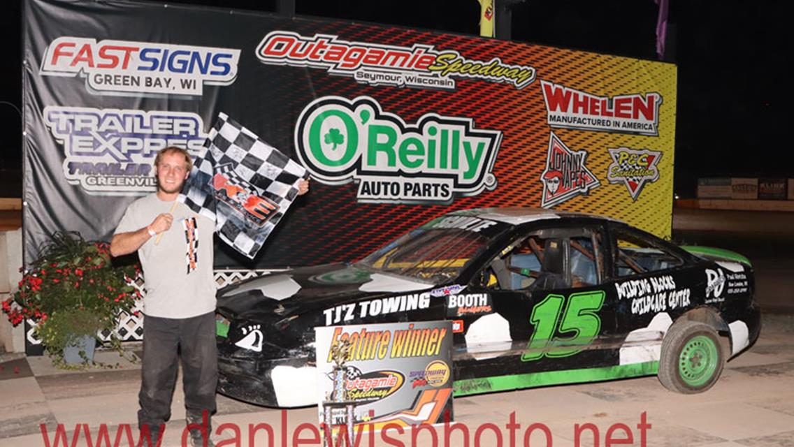 IMCA Sport Mod Rookie Coy Vlies cashes in at Outagamie Speedway.
