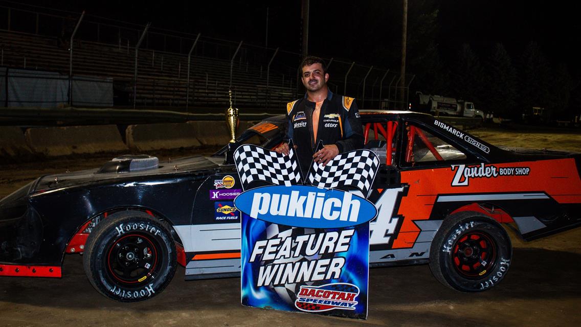 HELLMAN EDGES CARTER AT THE FINISH LINE
