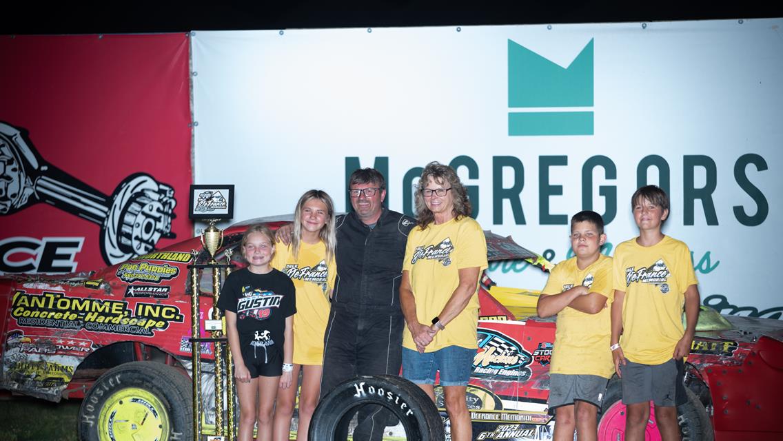 Kay collects Dale DeFrance Memorial checkers at Marshalltown Speedway