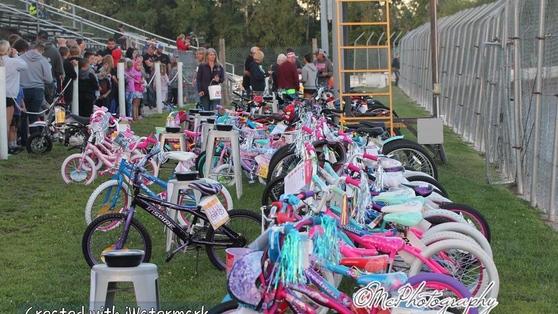 Nearly 100 Bikes Line the Front Stretch for Big O Bike Giveaway Night