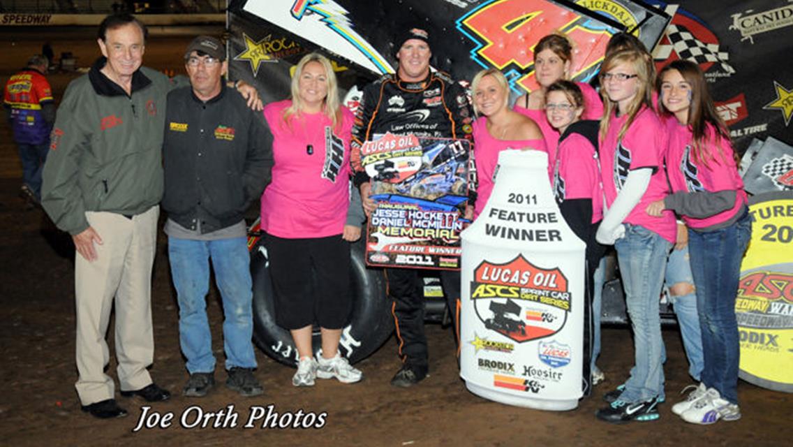 Jason Johnson is joined in Lucas Oil ASCS presented by K&amp;N Filters victory lane by Forrest Lucas (left), Jack Hockett (second from left) and a host of Hockett and McMillin family members after winning Saturday night&#39;s 30-lap Jesse Hockett / Daniel McMillin Memorial feature event at Lucas Oil Speedway in Wheatland, MO. (Joe Orth photo)