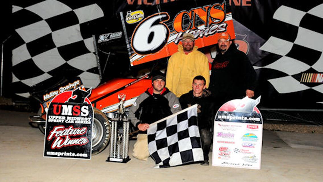 Kaley Gharst in Victory Lane following opening night win at Elko Speedway Fall Dirt Nationals.