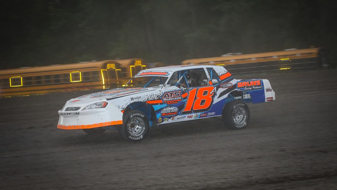 Photo: Mike Anderson claimed the night&#39;s Stock Car feature win after an exciting battle with defending Stock Car champion, Rob VanMil. Photo by Mike Spieker.